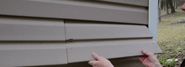Remove-Siding-To-Replace-Holes-In-Vinyl-Siding-The-Daily-DIY (1)